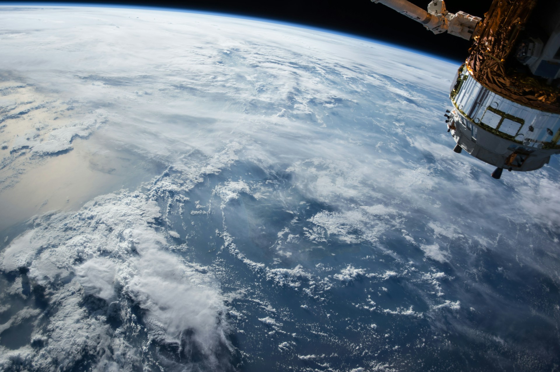 A satellite in orbit around the planet. Photo by NASA.